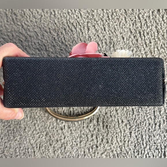 EUC BLACK SPARKLY HANDBAG WITH FLORAL ARRAY ON FRONT. Clasp has crystals. - Picture 4 of 8